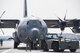 Airman with the 374th Maintenance Squadron tow a C-130J Super Hercules across the flightline, Feb. 27, 2018, at Yokota Air Base, Japan.