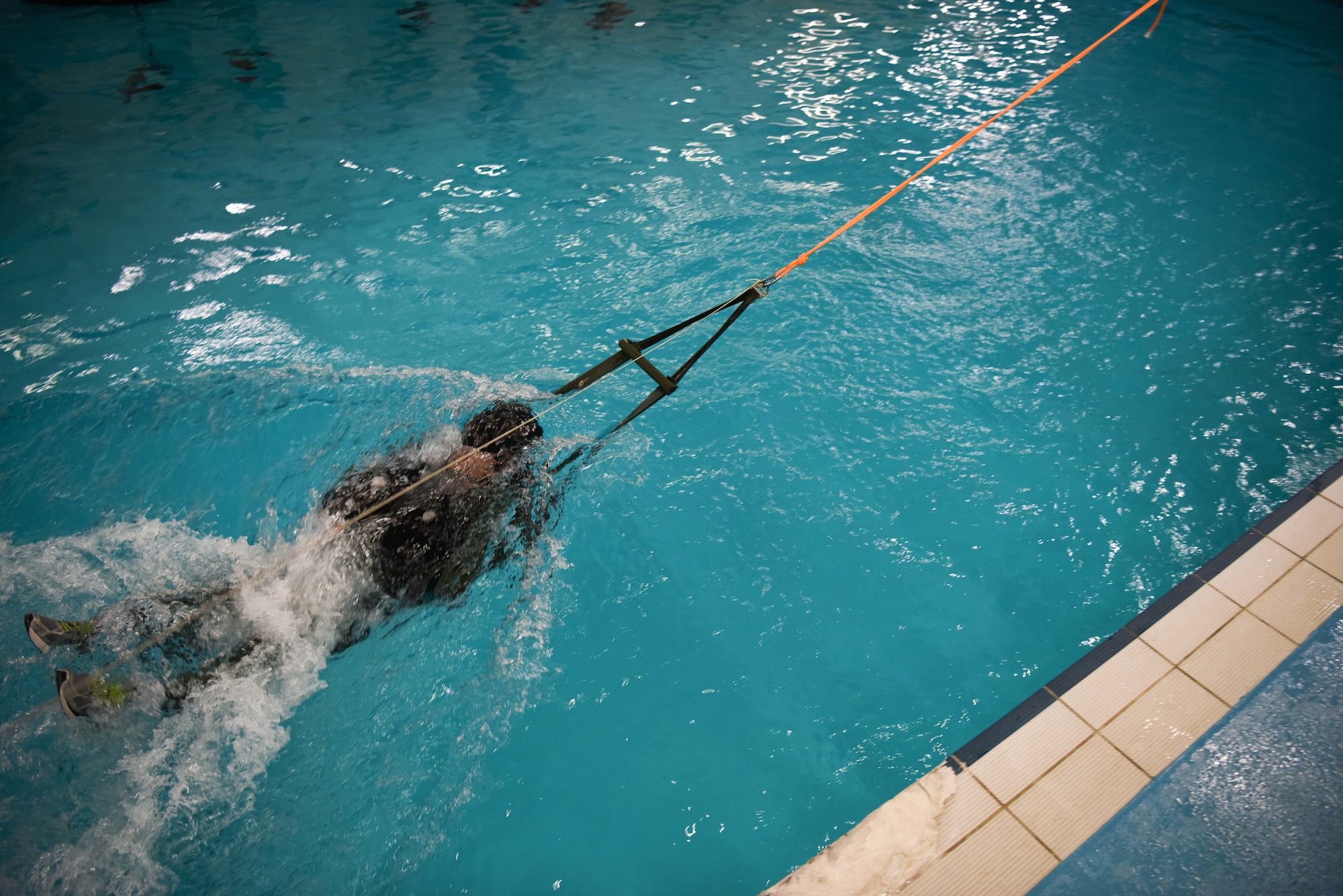 Airmen from the 352d Special Operations Wing, the 48th Fighter Wing and the 100th Air Refueling Wing perform evasive maneuvers and water survival techniques during survival, evasion, resist and escape (SERE) training, March 2018, at RAF Mildenhall. (U.S. Army photo by Staff Sgt. Philip Steiner)