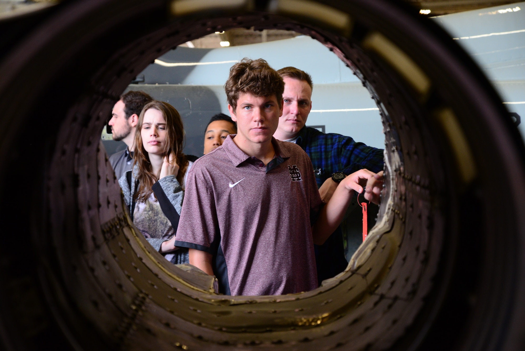 David Mongeau, a Mississippi State University Aircraft Propulsion student, examines the shell of a T-38C Talon engine April 4, 2018, on Columbus Air Force Base, Mississippi. An aerospace engineering student will spend over 1,000 hours in their classroom learning the different components of aircraft. (U.S. Air Force photo by Airman 1st Class Beaux Hebert)