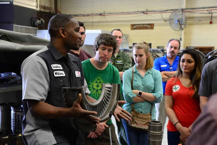 Rodney Williams, L3 Communications Propulsion Lab leadman, talks with the Mississippi State University Aircraft Propulsion Class about parts of a T-38C Talon engine April 4, 2018, on Columbus Air Force Base, Mississippi. The majority of aircraft mechanics on Columbus AFB are contracted through L3 Communications. (U.S. Air Force photo by Airman 1st Class Beaux Hebert)