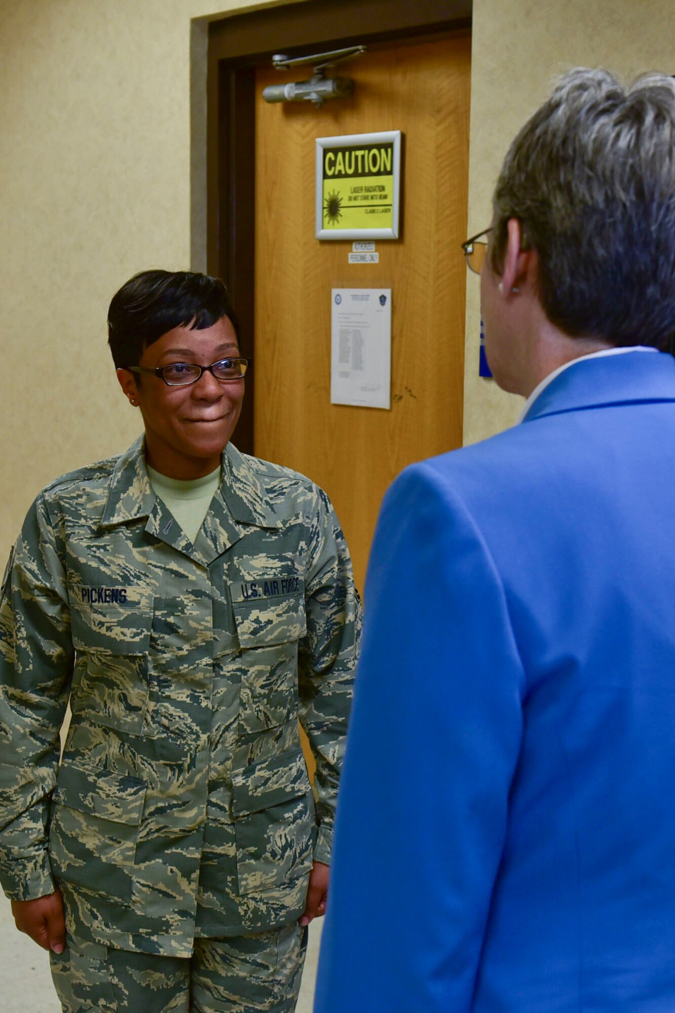 U.S. Air Force Reserve Master Sgt. Stephanie Pickens, installation personnel readiness non-commissioned officer in charge, 913th Airlift Group, speaks with Secretary of the Air Force Heather Wilson at Little Rock Air Force Base, Ark., March 26, 2018. Wilson spent time at the Air Force’s largest C-130 base in the world speaking about her priorities, which included enhancing readiness, innovation efforts and squadron revitalization. (U.S. Air Force photo by Airman 1st Class Rhett Isbell)