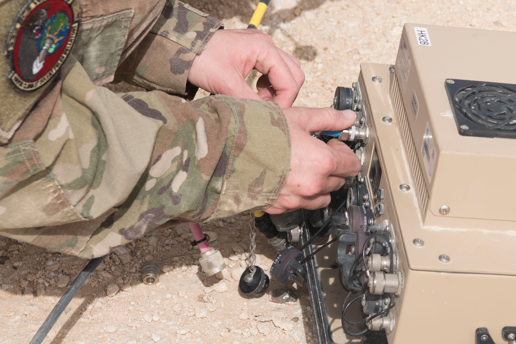 Airman 1st Class Riley Warren, 332nd Expeditionary Communications Squadron cyber transport technician and native of Fort Worth, Texas, uses a communication flyaway kit to set up communication ability as part of an exercise March 22, 2018, at an undisclosed location in Southwest Asia.