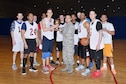 U.S. Air Force Lt. Col. Sean Park, 55th Mission Support Group deputy commander, presents the 2018 Offutt Intramural Basketball championship trophy to the 20th Intelligence Squadron after they defeated the 595th Aircraft Maintenance Squadron 75-67 at the Offutt Field House April 5. The 20th completes their season at 14-3, while the 595th finishes at 12-3. (U.S. AIr Force photo by Charles Haymond)