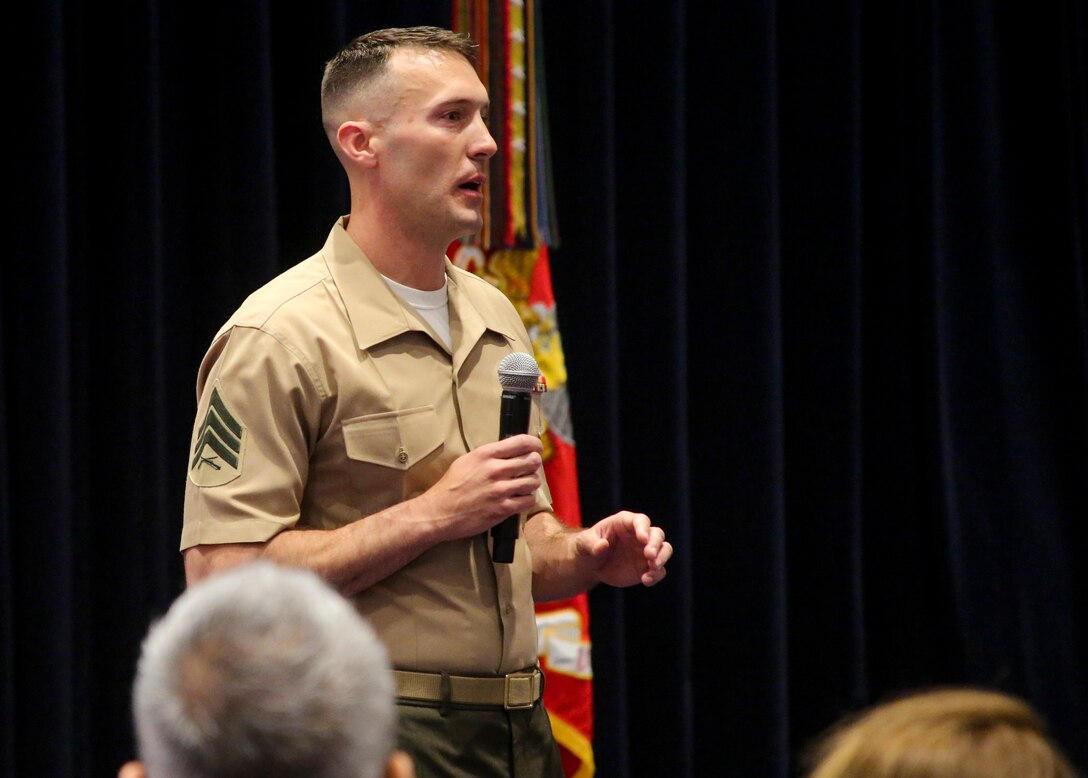 Sergeant Kenneth Newton, the 37th Color Sergeant of the Marine Corps, speaks to guests during the Color Sergeant of the Marine Corps relief and appointment ceremony at Marine Barracks Washington D.C., April 6, 2018. Newton, a Colorado Springs, Colorado native served as the senior sergeant of the Marine Corps and was entrusted with carrying the National Ensign in ceremonies throughout the National Capitol Region and across the nation. He led the official Color Guard Platoon at MBW and was responsible for training and preparing the Marines for future service in the operating forces. (Official Marine Corps photo by Cpl. Damon Mclean/Released)