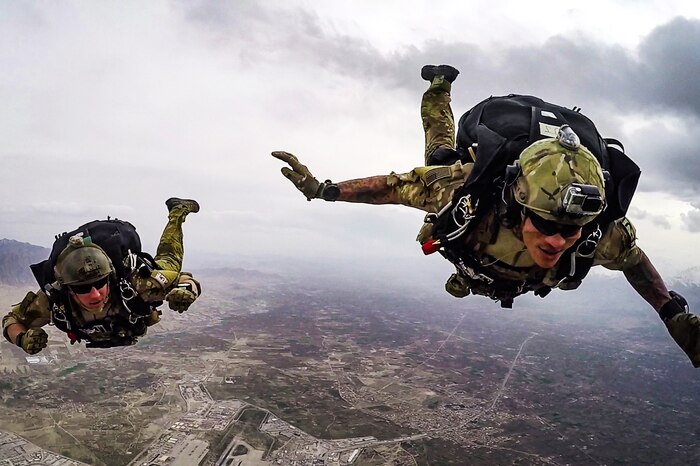 Airmen conduct a high-altitude, low-opening military free-fall jump.