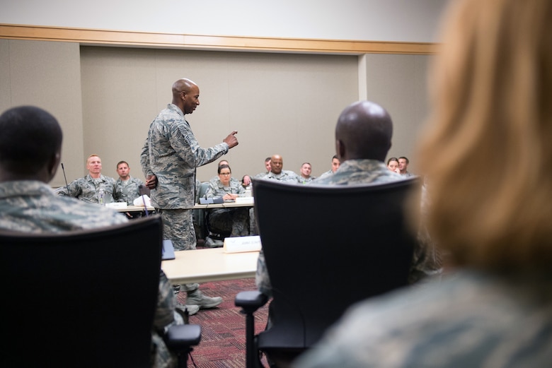 U.S. Air Force Chief Master Sgt. of the Air Force Kaleth O. Wright greets a Chief Master Sgt. attending an Air Force Element Senior Enlisted Leader Conference at the Pentagon, April 4, 2018.