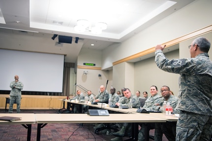 U.S. Air Force Chief Master Sgt. of the Air Force Kaleth O. Wright greets a Chief Master Sgt. attending an Air Force Element Senior Enlisted Leader Conference at the Pentagon, April 4, 2018.