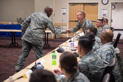 U.S. Air Force Chief Master Sgt. of the Air Force Kaleth O. Wright greets a Chief Master Sgt. attending an Air Force Element Senior Enlisted Leader Conference at the Pentagon, April 4, 2018.
