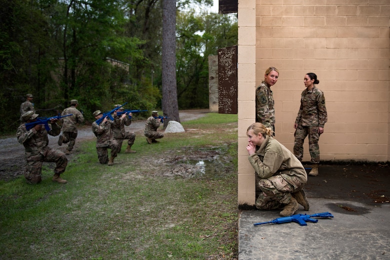 Airmen from the 824th Base Defense Squadron practice engaging with simulated hostile locals during dismounted training operations, March 26, 2018, at Moody Air Force Base, Ga. The operations conducted were a part of the 820th Base Defense Group’s (BDG) Initial Qualification Training, which is given to new Airmen coming into the BDG as an opportunity to learn a baseline of basic combat skills that will be needed to successfully operate as a cohesive unit while in a deployed environment. (U.S. Air Force photo by Airman 1st Class Erick Requadt)