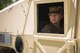 Airman 1st Class Emily Anderson, 822th Base Defense Squadron fireteam member, looks out the window frame of a Humvee during vehicle operations training, March 28, 2018, at Moody air Force Base, Ga The vehicle ops training is part of Initial Qualification Training, which gives new Airmen coming into the 820th Base Defense Group an opportunity to learn a baseline of basic combat skills that will be needed to successfully operate within a cohesive unit while in a deployed environment. (U.S. Air Force photo by Airman Eugene Oliver)