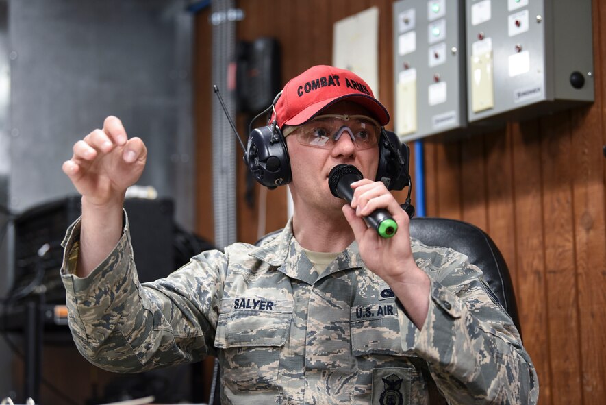 Air Force Staff Sgt. Damon Salyer, a 319th Security Forces Squadron firearms instructor, teaches a firearms course on Grand Forks Air Force Base, N.D., on Apr. 4, 2018. Salyer was leading students in exercises and instructing when to fire their weapon. (Air Force photo by Airman 1st Class Melody Wolff)