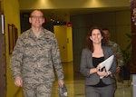 Air Force Brig. Gen. Martin Chapin walks with Rachel Dunlap