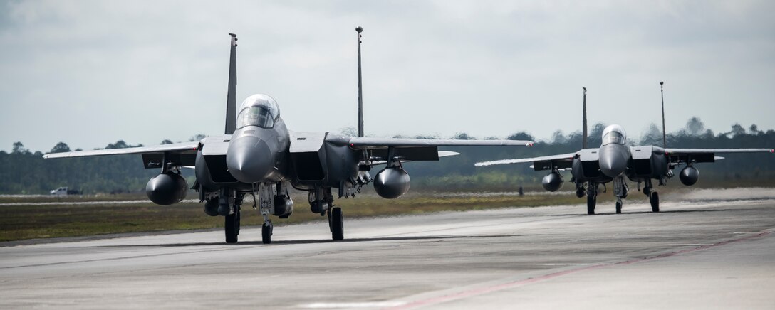 Image of two F-15E Strike Eagles taxying down the runway at Tyndall Air Force Base, Florida, April 3, 2018. Combat Archer and Hammer tests both air-to-air and air-to-ground maneuvers. 
(U.S. Air Force photo by Staff Sgt Jeremy L. Mosier)