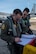 1st Lts. Jacob Del Ponte (left), 336th Fighter Squadron pilot, and Shane O’Connell, 335th Fighter Squadron weapon systems officer, check the maintenance log of an F-15E Strike Eagle prior to take off for Razor Talon, April 6, 2018, at Seymour Johnson Air Force Base, North Carolina.