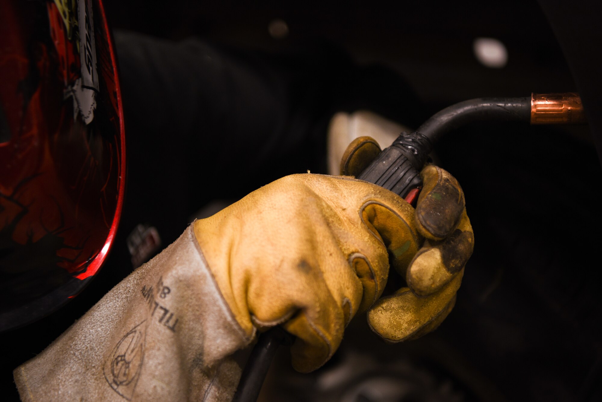 After receiving a damaged vehicle, Airmen in the 90th Logistics Readiness Squadron weld new parts onto it at F.E. Warren Air Force Base, Wyo., April 6, 2018. In order to repair the truck, Airmen removed the damaged piece from the frame and a new identical piece was attached. The team of Airmen will finish the new part off with a fresh paint of coat to match the truck. (U.S. Air Force photo by Airman 1st Class Abbigayle Wagner)