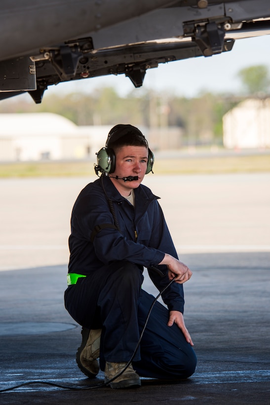Airman Justin Fralick, 4th Aircraft Maintenance Squadron crew chief, completes final checks before launching an F-15E Strike Eagle for Razor Talon, April 6, 2018, at Seymour Johnson Air Force Base, North Carolina.