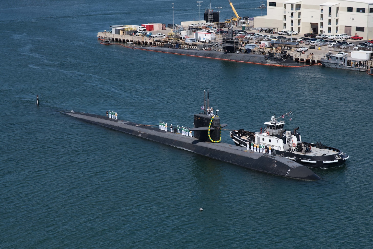 PEARL HARBOR, Hawaii (April 6, 2018) The Los Angeles-class fast-attack submarine USS Bremerton (SSN 698) returns to Joint Base Pearl Harbor-Hickam following a six-month Western Pacific deployment, April 6. (U.S. Navy photo by Mass Communication Specialist 1st Class Daniel Hinton/ Released)