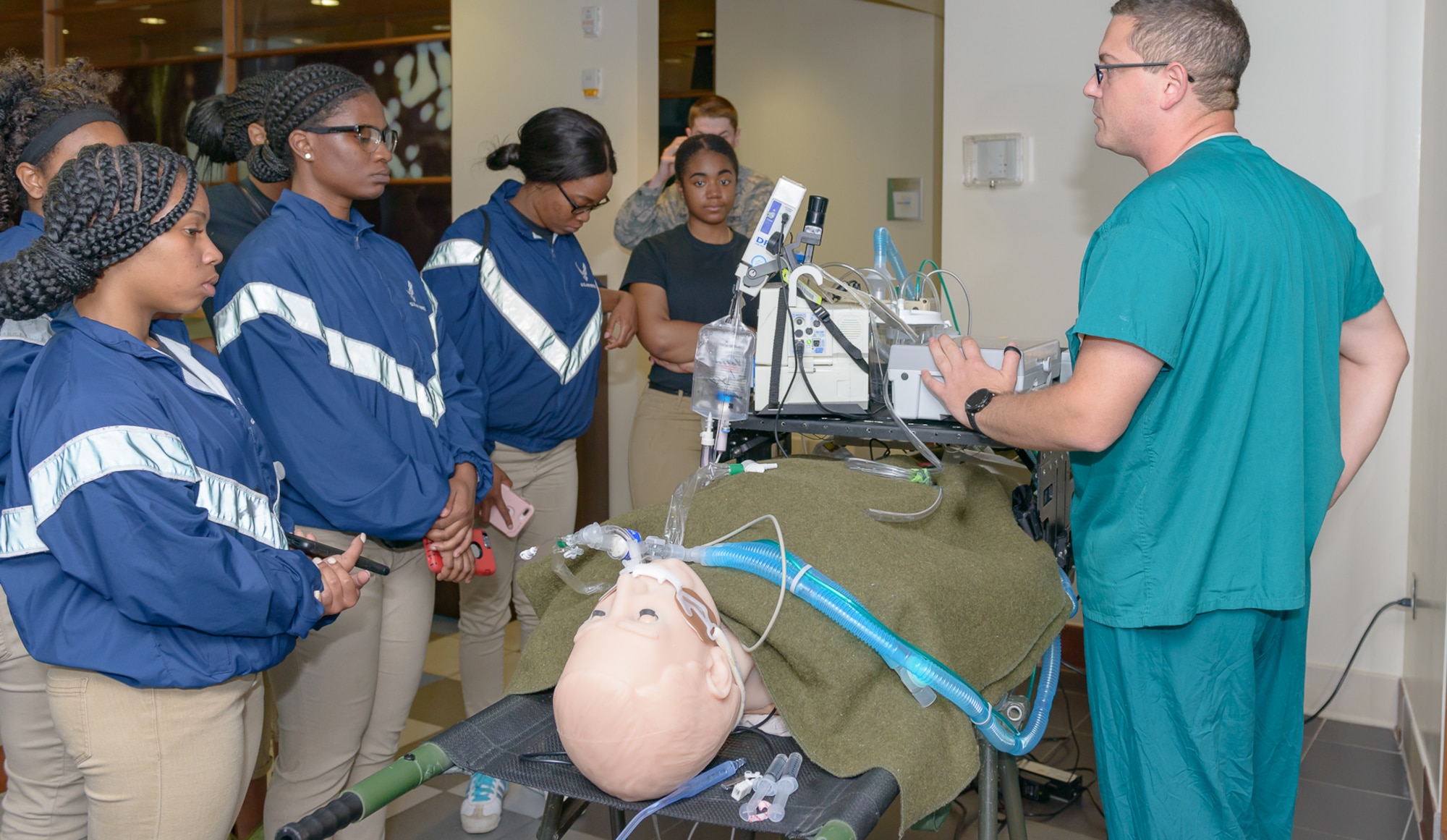 Alabama State University Air Force ROTC cadets, receive a briefing on Critical Care Air Transport Team procedures during Pathways to Blue April 6, 2018, on Keesler Air Force Base, Mississippi. The two-day schedule included orientation sessions in science technology engineering and mathematics, operations, and support areas such as cyber, battlefield Airmen, medical, and aircrew flight operations. Keesler was home to 280 cadets from 15 universities April 6-7 as part of Pathways to Blue, a diversity outreach event hosted by the 2nd Air Force.  (U.S. Air Force photo by Andre’ Askew)