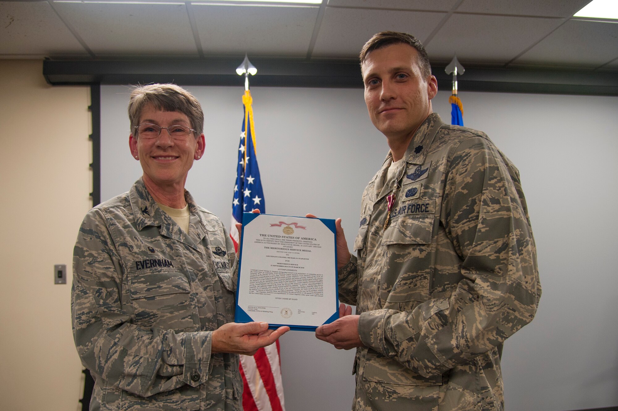 Col. Caroline Evernham awards the Meritorious Service Medal to Lt. Col. Michael Stapleton. The award was given during the change of the command ceremony held during the Unit Training Assembly.