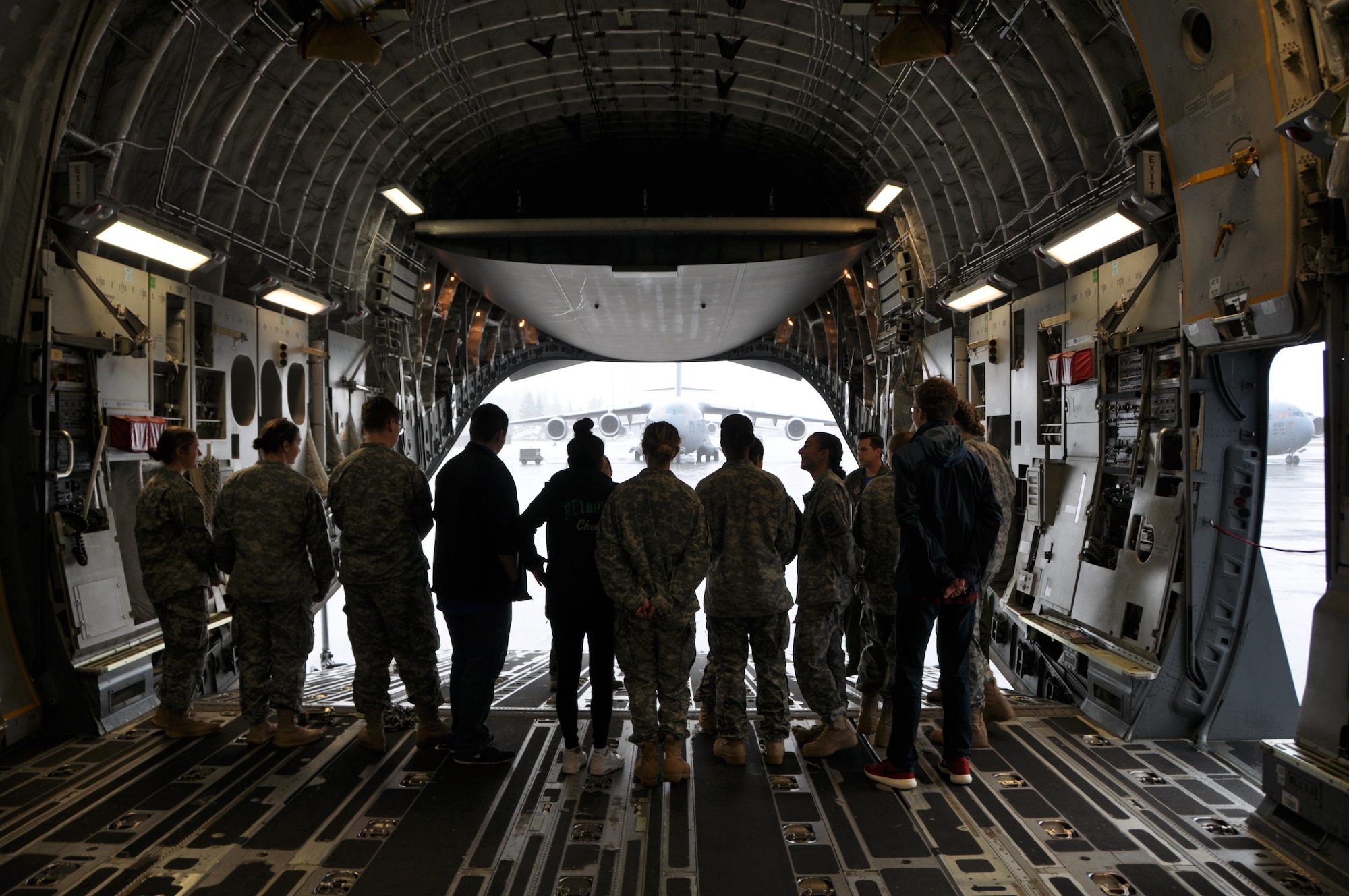 U.S. Air Force Tech. Sgt. Kyle Harris, assigned to the 728th Airlift Squadron shows Reynolds High School Army JROTC cadets the capabilities of the C-17 at Joint Base Lewis-McChord on April 7, 2018. (U.S. Air Force by 1st Lt. Alyssa Hudyma)