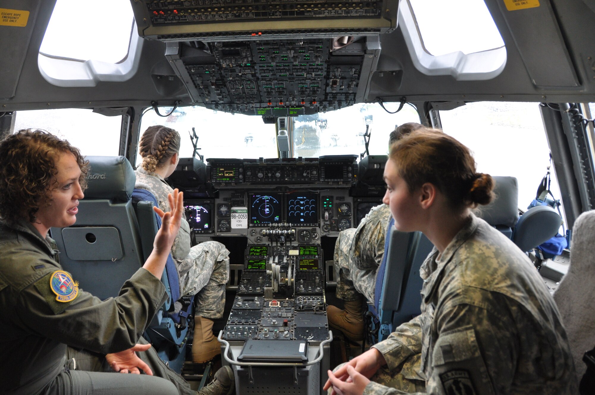 U.S. Air Force 1st Lt. Kelsey Kelley, assigned to the 728th Airlift Squadron tells Reynolds High School Army JROTC cadets what it is like to be a C-17 pilot at Joint Base Lewis-McChord on April 7, 2018. (U.S. Air Force by 1st Lt. Alyssa Hudyma)