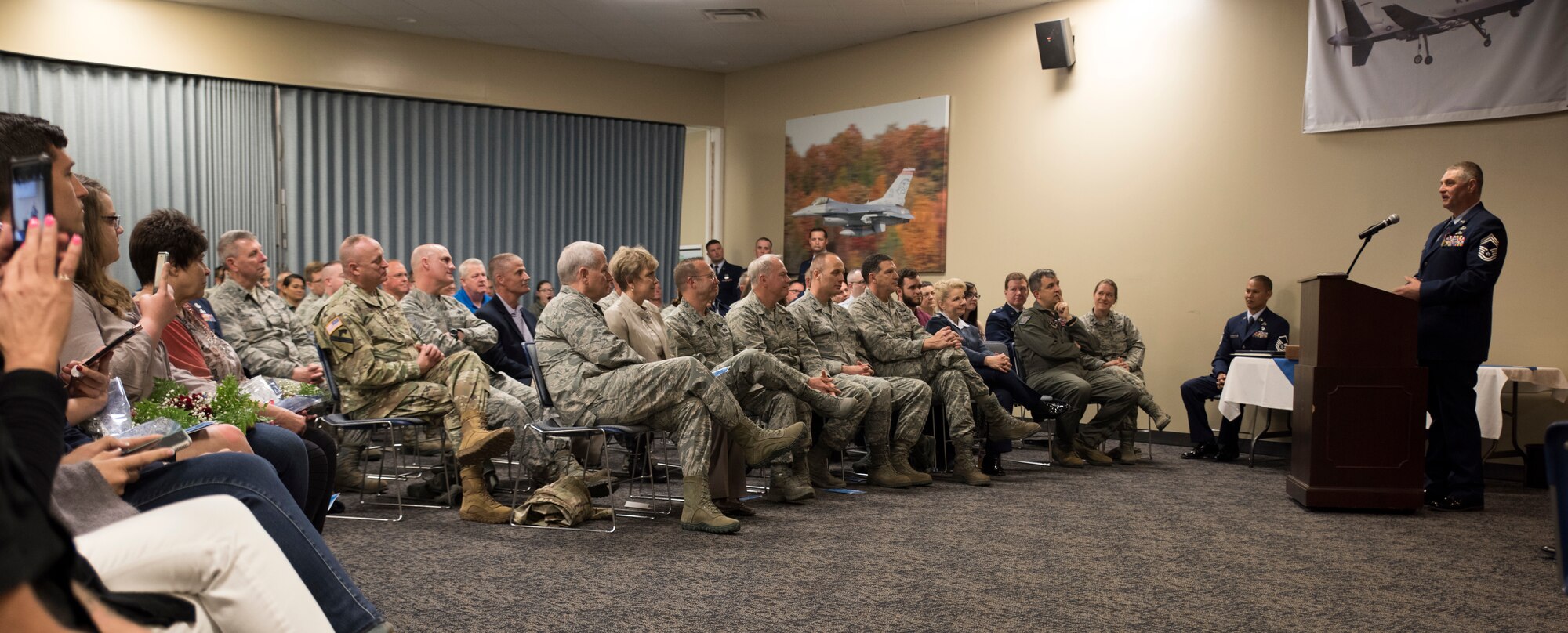 Newly retired Cheif Master Sgt. Ronald W. Redding, former 188th Civil Engineering Squadron Emergency Management Chief, addresses members of the 188th Wing during his retirement ceremony at Fort Smith, AR., Apr. 07, 2018. (U.S. Air National Guard photo by Tech. Sgt. Daniel Condit)