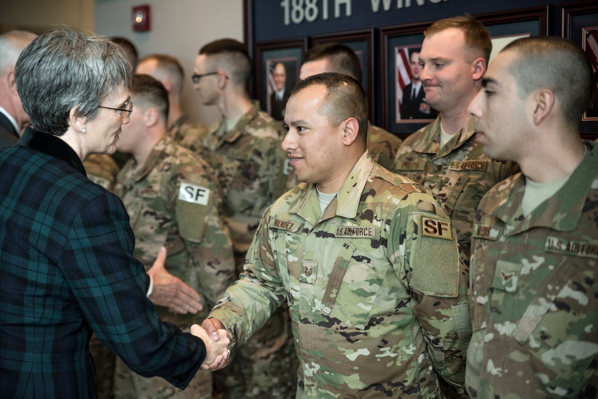 Tech. Sgt. Edgar Gonzalez, 188th Security Forces Squadron Member shakes hands with Secretary of the Air Force Heather Wilson at Ebbing Air National Guard Base, Fort Smith, Ark., Mar. 26 , 2018.  The 188th Defenders will be deploying in support of Operation Freedom's Sentinel, as part of the Air National Guard's federal mission to provide support during wartime operations.  (U.S. Air National Guard photo by Senior Airman Matthew Matlock)