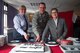 Lady Delia Thornton, Trustee for the RAF Charitable Trust and 423rd Air Base Squadron Honorary Commander, Colonel Eric Oliver, 423rd Air Base Group Commander and Squadron Leader Jayne Robertson, RAF
Squadron Leader for RAF Fairford, cut cake inside the Community Activity Center as part of the 100th RAF Baton Relay Race on RAF Fairford, April 6, 2018. The event was part of the RAF 100th Birthday Baton Relay. (U.S. Air Force photo by Senior Airman Chase Sousa)