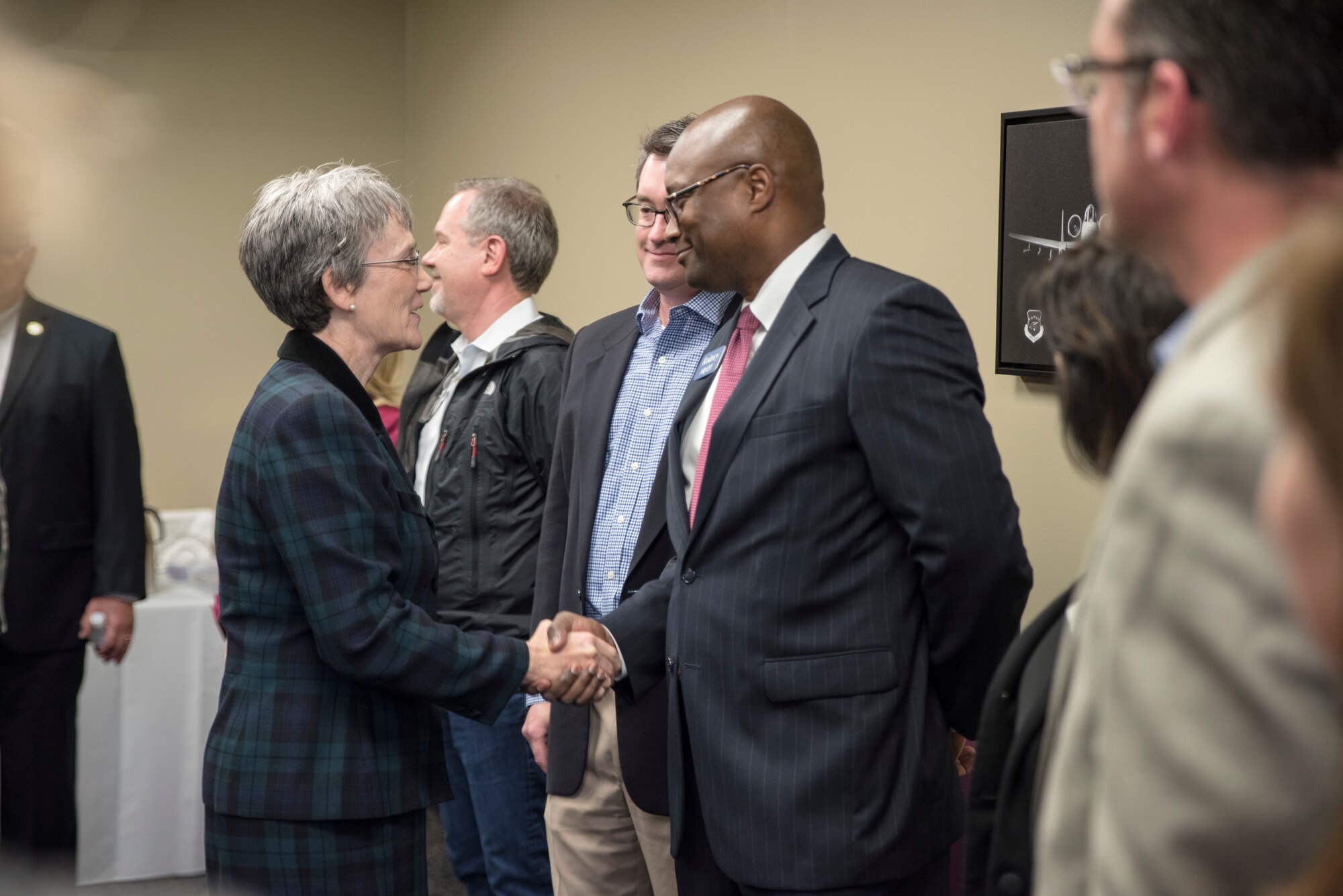 Secretary of the Air Force Heather Wilson (left) shakes hands with a member of Fort Smith’s Civil leaders during a meet and greet at Ebbing Air National Guard Base, Fort Smith, Ark., Mar. 26 , 2018.  Wilson spoke highly of the Wing’s success and thank civil leaders for their perpetual support.  (U.S. Air National Guard photo by Senior Airman Matthew Matlock)