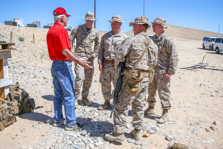 David Dangwillow, board member, Desert Cities Mitchell Paige Medal of Honor Chapter, 1st Marine Division Association, speaks to a group of Marines with 7th Marine Regiment about his time in Vietnam during an Alumni Day hosted by 7th Marine Regiment aboard the Marine Corps Air Ground Combat Center, Twentynine Palms, Calif., March 28, 2018. The day was hosted to cultivate and strengthen relationships between active-duty Marines and those who served. (U.S. Marine Corps photo by Lance Cpl. Rachel K. Porter)