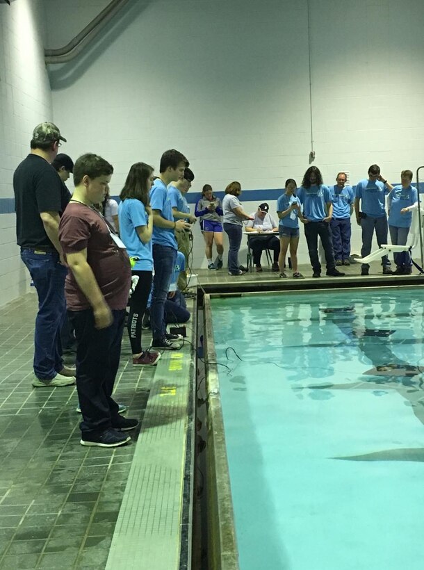 On Saturday, April 7, 2018, area students competed in a Regional SeaPerch Competition held at North Daviess High School. The Science, Technology, Engineering and Mathematics (STEM) team at Naval Surface Warfare Center, Crane Division (NSWC Crane) organized the competition, and many NSWC Crane employees served as coaches and volunteers for the event.