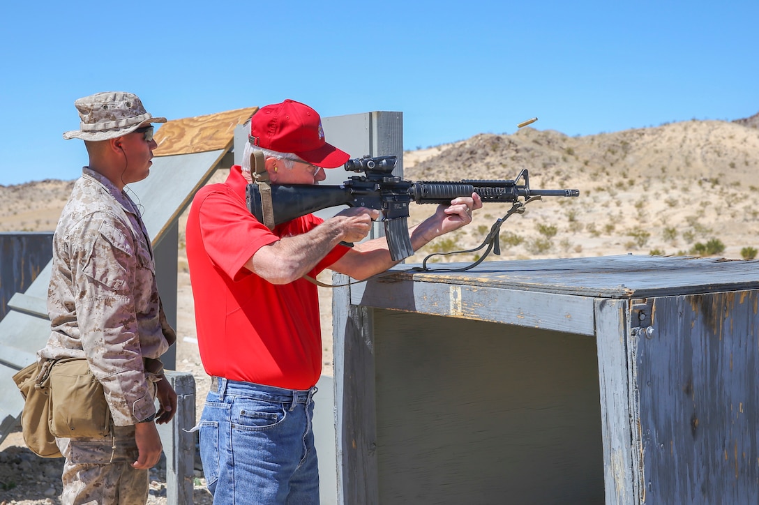 David Dangwillow, board member, Desert Cities Mitchell Paige Medal of Honor Chapter, 1st Marine Division Association, participates in a live-fire rifle shoot during an Alumni Day hosted by 7th Marine Regiment aboard the Marine Corps Air Ground Combat Center, Twentynine Palms, Calif., March 28, 2018. The day was hosted to cultivate and strengthen relationships between active-duty Marines and those who served. (U.S. Marine Corps photo by Lance Cpl. Rachel K. Porter)