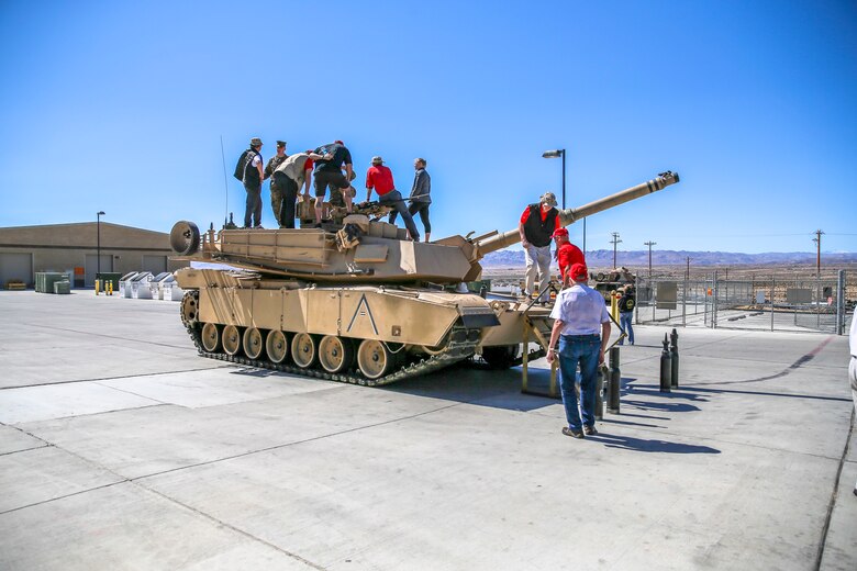 Veterans with the Desert Cities Mitchell Paige Medal of Honor Chapter, 1st Marine Division Association, tour the tanks of today’s Marine Corps during an Alumni Day hosted by 7th Marine Regiment aboard the Marine Corps Air Ground Combat Center, Twentynine Palms, Calif., March 28, 2018. The day was hosted to cultivate and strengthen relationships between active-duty Marines and those who served. (U.S. Marine Corps photo by Lance Cpl. Rachel K. Porter)
