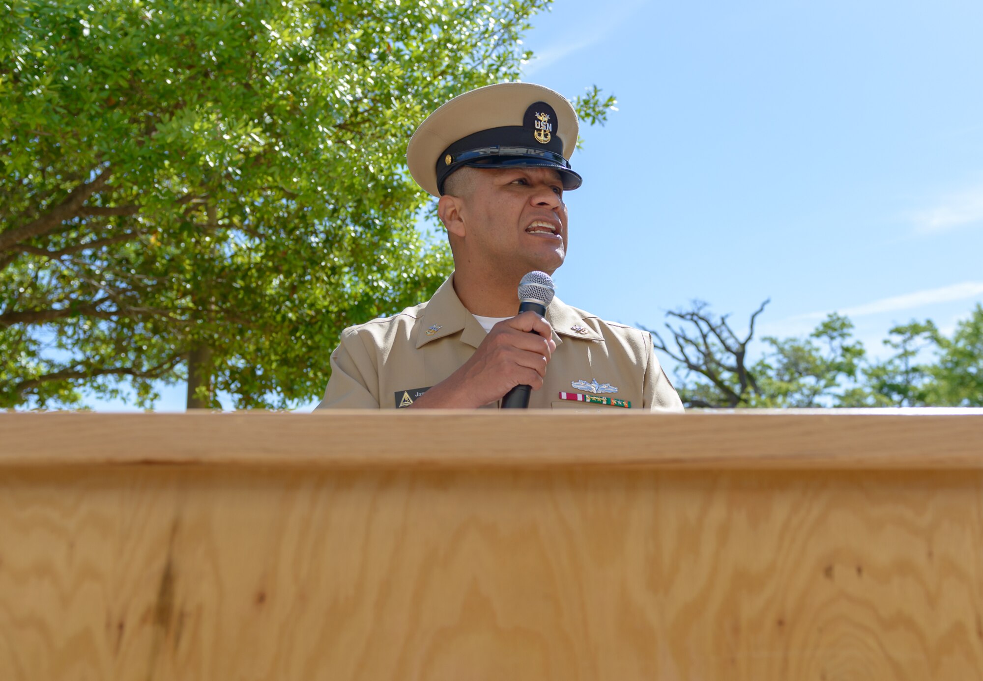 U.S. Navy Master Chief Petty Officer James Contreras, Center for Naval Aviation Technical Training Unit Keesler command master chief, delivers opening remarks during the CNATTU Keesler’s Chief Petty Officer Birthday Ceremony at Keesler Air Force Base, Mississippi, April 5, 2018. The U.S. Navy’s Chief Petty Officers are celebrating 125 years of heritage and the naval tradition of Unity, Service and Navigation, which is part of their rate emblem, is symbolized by a fouled anchor with the letters “USN” centered on the anchor. (U.S. Air Force photo by André Askew)