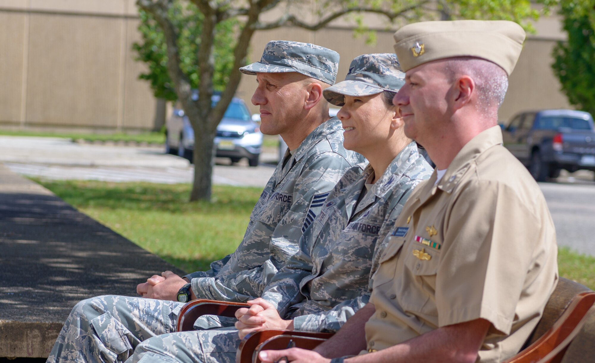 U.S. Air Force Chief Master Sgt. Ken Carter (left) and Col. Debra Lovette (center) attend the Center for Naval Aviation Technical Training Unit Keesler’s Chief Petty Officer Birthday Ceremony at Keesler Air Force Base, Mississippi, April 5, 2018. The U.S. Navy’s Chief Petty Officers are celebrating 125 years of heritage and the naval tradition of Unity, Service and Navigation, which is part of their rate emblem, is symbolized by a fouled anchor with the letters “USN” centered on the anchor. (U.S. Air Force photo by André Askew)