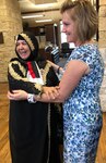 Paula Johnson (right) welcomes Aliyah Khalaf Saleh, known as Umm Qusay in Iraq, to the Warrior and Family Support Center as part of the Iraqi humanitarian’s visit to Joint Base San Antonio-Fort Sam Houston, March 26, 2018. Umm Qusay was one of 10 women from around the world honored with the 2018 Secretary of State’s International Women of Courage award.