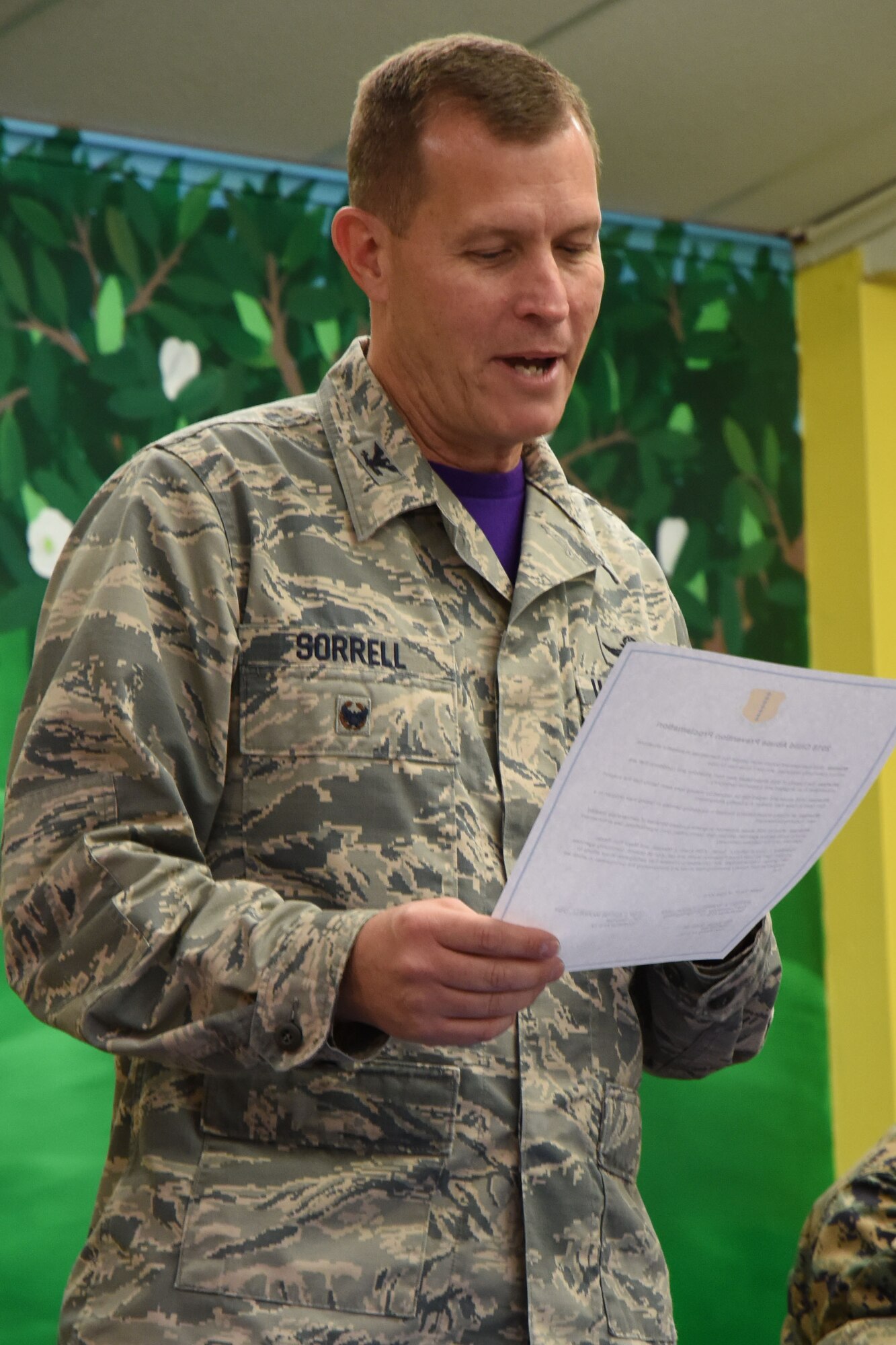 U.S. Air Force Col. Jeffrey Sorrell, 17th Training Wing vice commander, reads the Child Abuse Prevention Proclamation in observation of Child Abuse Prevention month at the Resiliency Center on Goodfellow Air Force Base, Texas, April 6, 2018. The proclamation is designed to bring awareness to child abuse and pass on ways that can prevent it from happening. (U.S. Air Force photo by Airman 1st Class Seraiah Hines/Released)