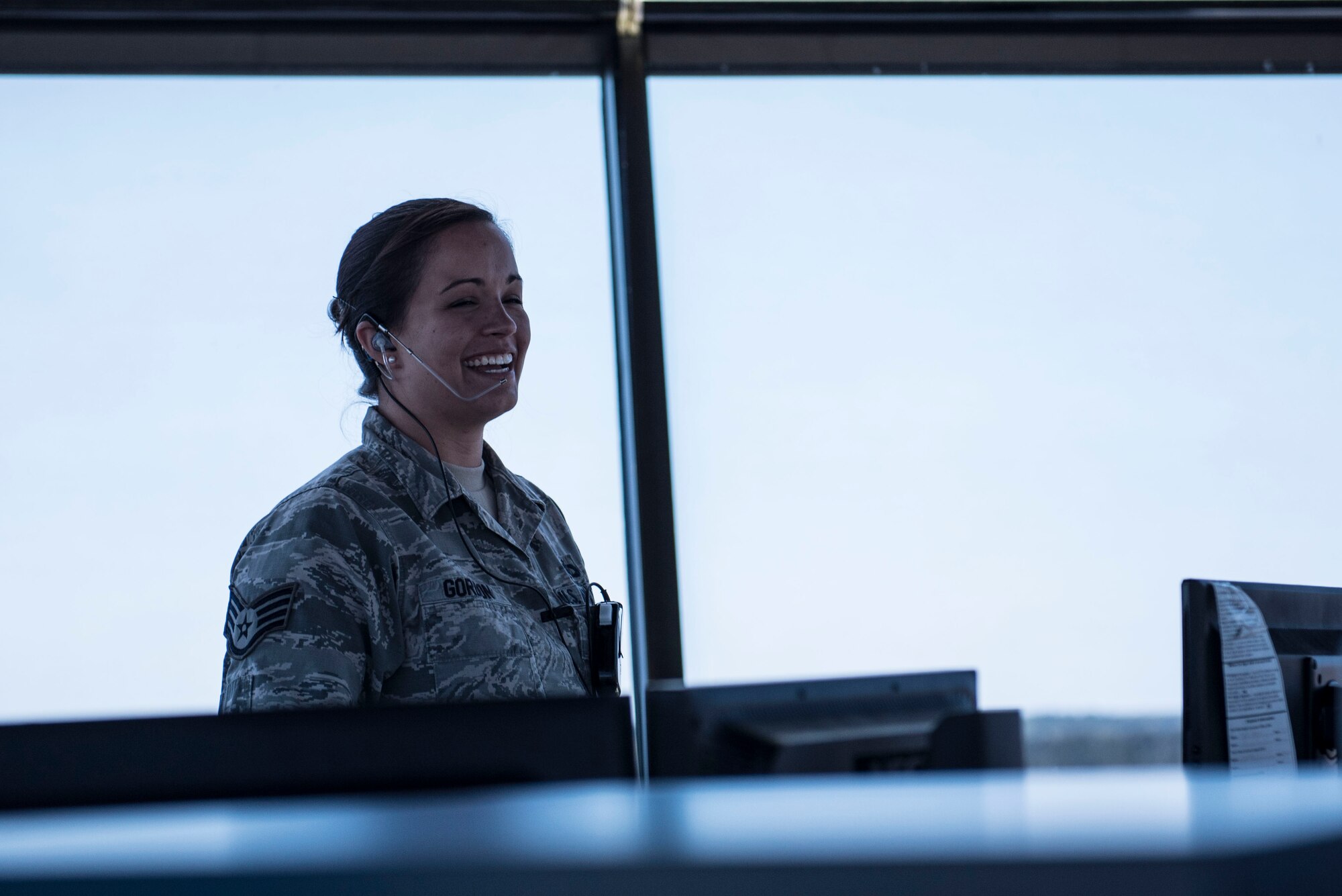 U.S. Air Force Staff Sgt. Elizabeth Gordon, 20th Operations Support Squadron watch supervisor, laughs while speaking to her Airmen at Shaw Air Force Base, S.C., April 5, 2018.