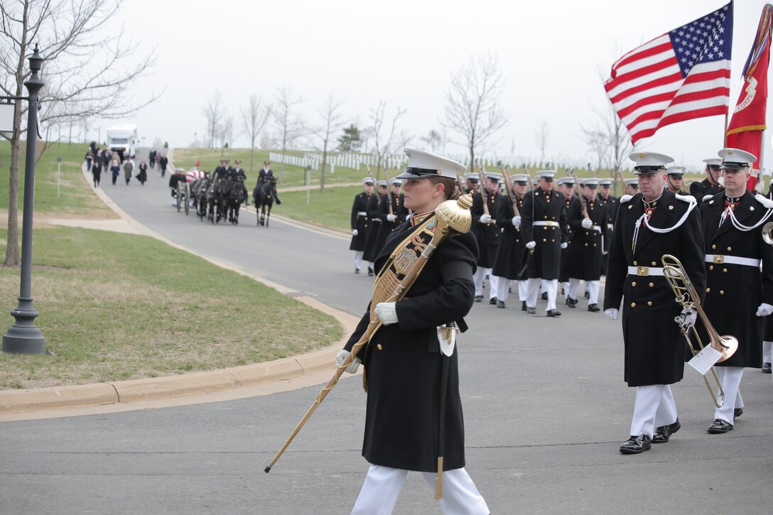 On April 9, 2018, the Marine Band participated in the funeral and repatriation ceremony for World War II casualty Pvt. Edwin Jordan, USMC. Pvt. Jordan was killed in action on Nov. 20, 1943 during the Battle of Tarawa in the central Pacific Ocean. In July 2017, History Flight, a private organization, excavated what was believed to be a wartime fighting position on the small island of Betio in the Tarawa Atoll of the Gilbert Islands. The Defense POW/MIA Accounting Agency used circumstantial evidence and forensic identification tools to identify Pvt. Jordan. His remains were returned to the United States and buried at Arlington National Cemetery with full military honors. (U.S. Marine Corps photo by Master Sgt. Kristin duBois/released)