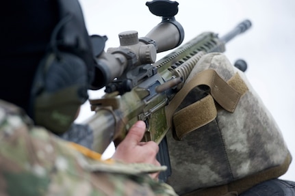 Army Spc. Arturo Dominguez, a native of Okeechobee, Fla., assigned to Charlie Troop, 1st Squadron, 40th Cavalry Regiment (Airborne), 4th Infantry Brigade Combat Team (Airborne), 25th Infantry Division, U.S. Army Alaska, fires a M110 Semi-Automatic Sniper System at a long-distance target on Statler range at Joint Base Elmendorf-Richardson, Alaska, April 6, 2018, during marksmanship training.  A sniper's main responsibility is to deliver discriminatory, highly accurate rifle fire against enemy targets that cannot be engaged successfully by the regular rifleman due to range, size, location, fleeting nature, or visibility.