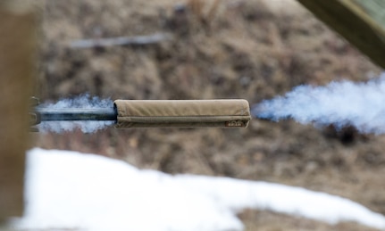 Gas escapes from the barrel of a M2010 Enhanced Sniper Rifle as a paratrooper assigned to the 1st Squadron, 40th Cavalry Regiment (Airborne), 4th Infantry Brigade Combat Team (Airborne), 25th Infantry Division, U.S. Army Alaska, fires at a long-distance target on Statler range at Joint Base Elmendorf-Richardson, Alaska, April 6, 2018, during marksmanship training.  A sniper's main responsibility is to deliver discriminatory, highly accurate rifle fire against enemy targets that cannot be engaged successfully by the regular rifleman due to range, size, location, fleeting nature, or visibility.