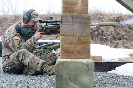 Army Spc. Eric Haugh, a native of Graham, Wash., assigned to Charlie Troop, 1st Squadron, 40th Cavalry Regiment (Airborne), 4th Infantry Brigade Combat Team (Airborne), 25th Infantry Division, U.S. Army Alaska, absorbes the recoil from a M2010 Enhanced Sniper Rifle on Statler range at Joint Base Elmendorf-Richardson, Alaska, April 6, 2018, during marksmanship training.  A sniper's main responsibility is to deliver discriminatory, highly accurate rifle fire against enemy targets that cannot be engaged successfully by the regular rifleman due to range, size, location, fleeting nature, or visibility.