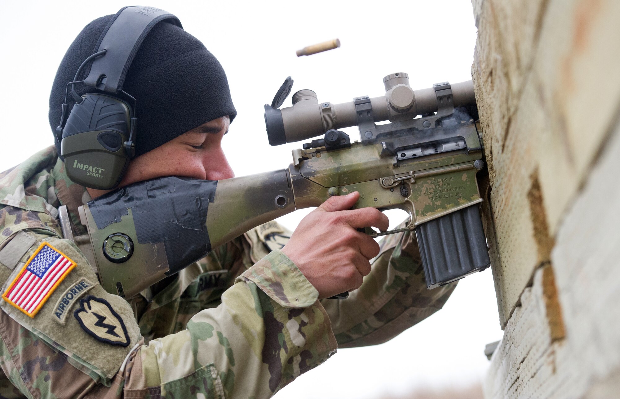 Army Spc. Arturo Dominguez, a native of Okeechobee, Fla., assigned to Charlie Troop, 1st Squadron, 40th Cavalry Regiment (Airborne), 4th Infantry Brigade Combat Team (Airborne), 25th Infantry Division, U.S. Army Alaska, fires a M110 Semi-Automatic Sniper System at a long-distance target on Statler range at Joint Base Elmendorf-Richardson, Alaska, April 6, 2018, during marksmanship training.  A sniper's main responsibility is to deliver discriminatory, highly accurate rifle fire against enemy targets that cannot be engaged successfully by the regular rifleman due to range, size, location, fleeting nature, or visibility.