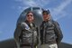 U.S. Air Force Maj. David McClintic, An electronic warfare officer assigned to the 11th Bomb Squadron, Barksdale Air Force Base, La. and retired Col. Pete Downes stand in front of a B-52 Stratofortress assigned to the 307th Bomb Wing durning the March Field 2018 Air and Space Expo April 8, 2018.