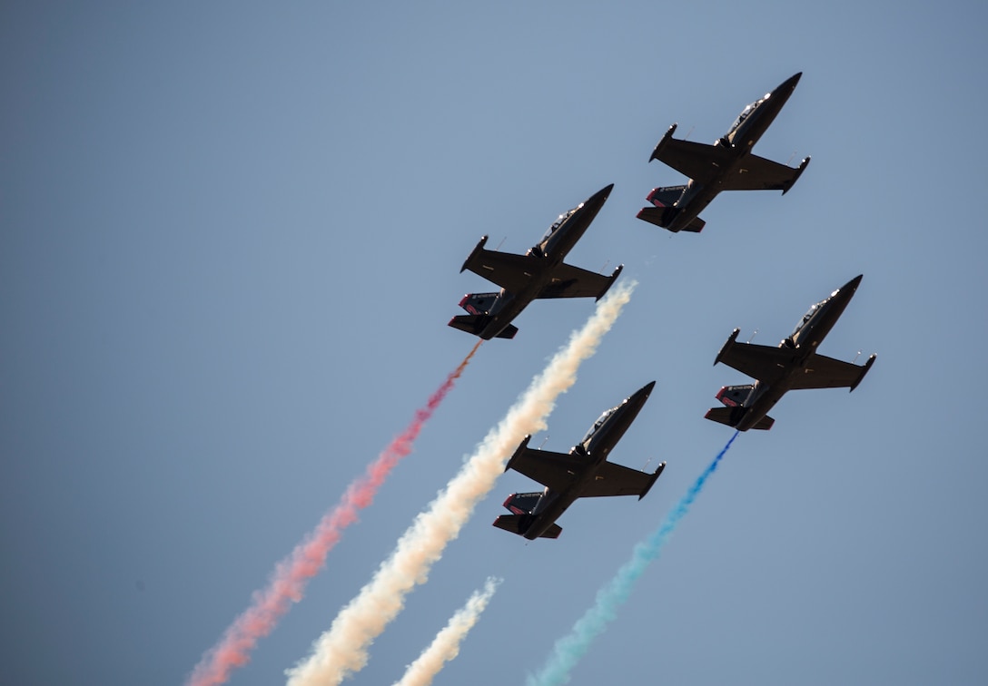 The 2018 Yuma Airshow headliner, The Patriots Jet Team, perform an acrobatic aerial display for spectators during the 2018 Yuma Airshow hosted by Marine Corps Air Station Yuma, Ariz., Saturday, March 17, 2018. The Patriots Jet Team, the largest civilian-owned aerobatic jet team in the western hemisphere, began with the vision of one person: Randy Howell. Fueled by passion for aviation since childhood, it became Howell's mission to create a six-jet precision demonstration team that could entertain, inspire, and educate. The airshow is MCAS Yuma's only military airshow of the year and provides the community an opportunity to see thrilling aerial and ground performers for free while interacting with Marines and Sailors. (U.S. Marine Corps photo by Lance Cpl. Sabrina Candiaflores)