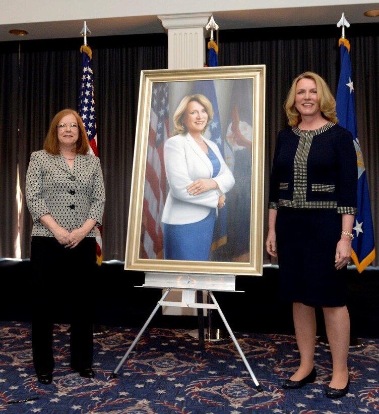 Former Secretary of the Air Force Deborah Lee James and Artist Michele Rushworth pose for a photo during a portrait unveiling ceremony at Joint Base Anacostia-Bolling, Washington, D.C., April 6, 2018. The portrait will be displayed at the Pentagon. (U.S. Air Force photo by Staff Sgt. Rusty Frank)
