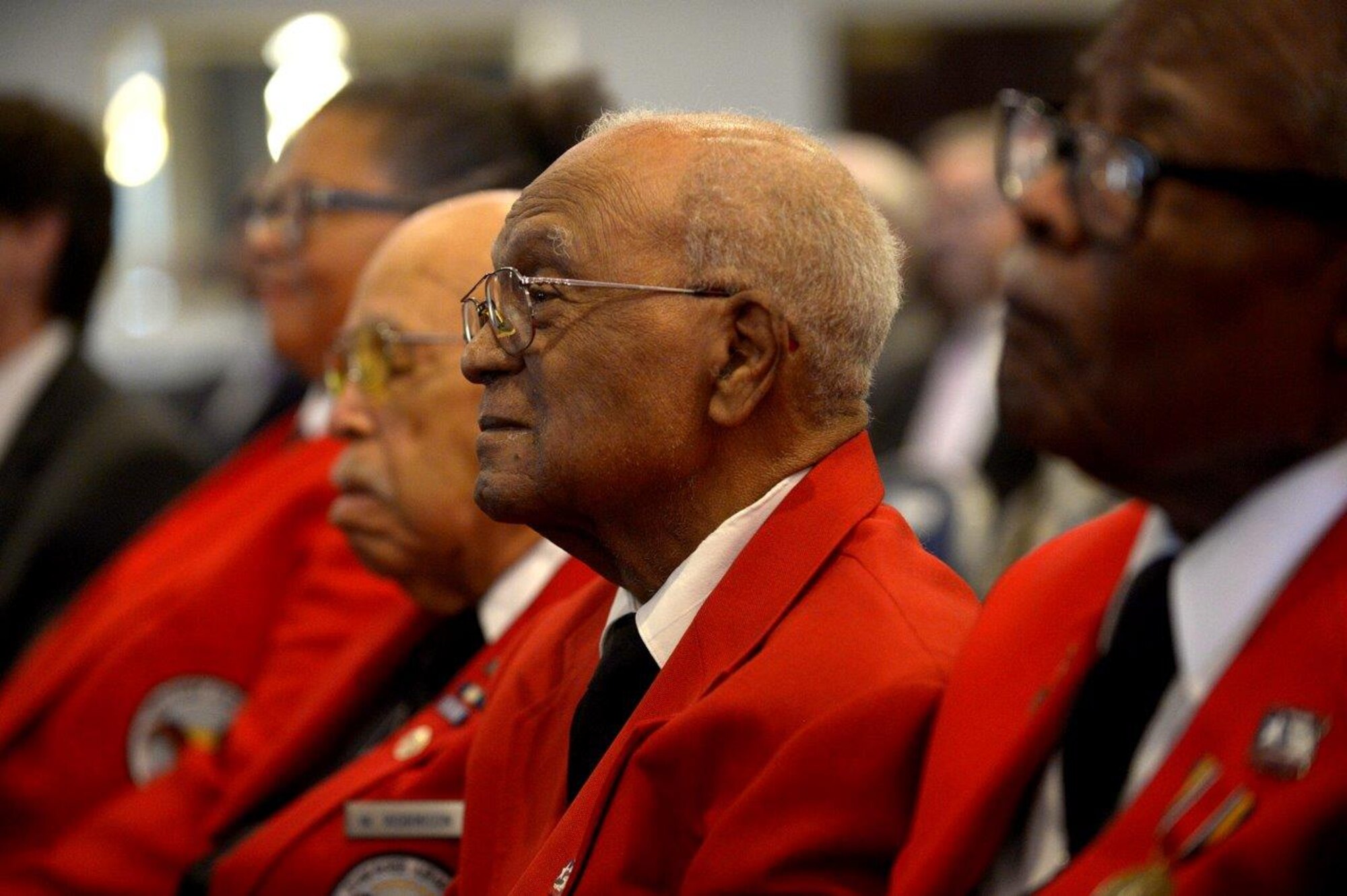 Tuskegee Airmen listen to former Secretary of the Air Force Deborah Lee James during a portrait unveiling ceremony at Joint Base Anacostia-Bolling, Washington, D.C., April 6, 2018. During her remarks, James spoke about how both past and present Airmen have influenced her career. (U.S. Air Force photo by Staff Sgt. Rusty Frank)