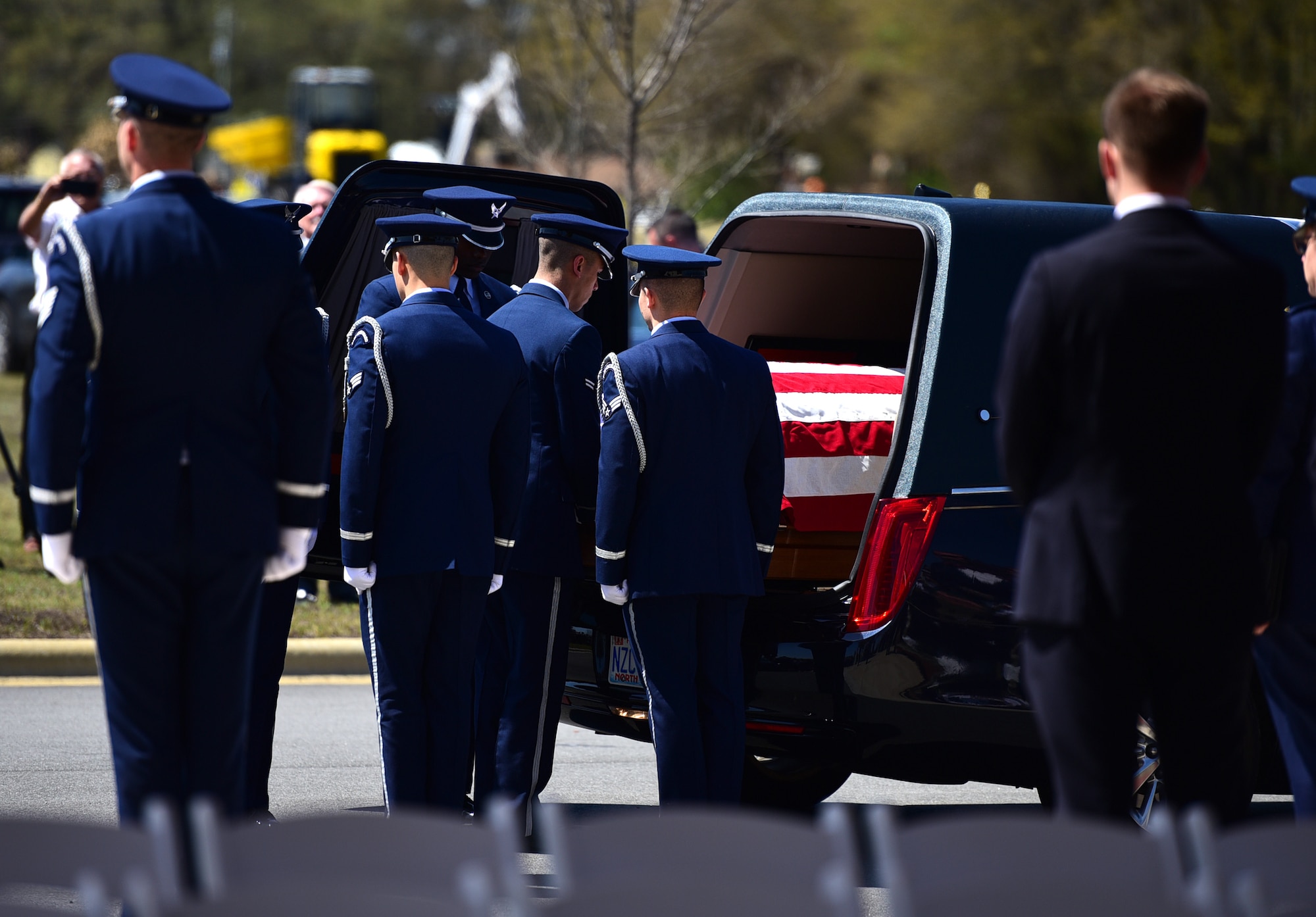 Members of the Seymour Johnson Honor Guard transfer the remains of Col. Edgar Davis April 6, 2018, in Goldsboro, North Carolina. Davis was shot down during a night photo-reconnaissance mission over Laos during the Vietnam War. After initial rescue efforts were unsuccessful, he was assumed dead and his remains stayed missing for 50 years. (U.S. Air Force photo by Senior Airman Christian Clausen)