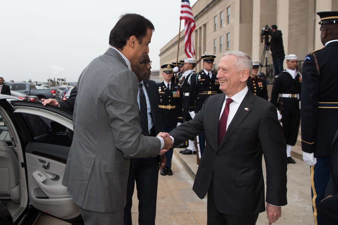 Defense Secretary James N. Mattis shakes hands with Sheikh Tamim bin Hamad Al Thani, emir of Qatar.