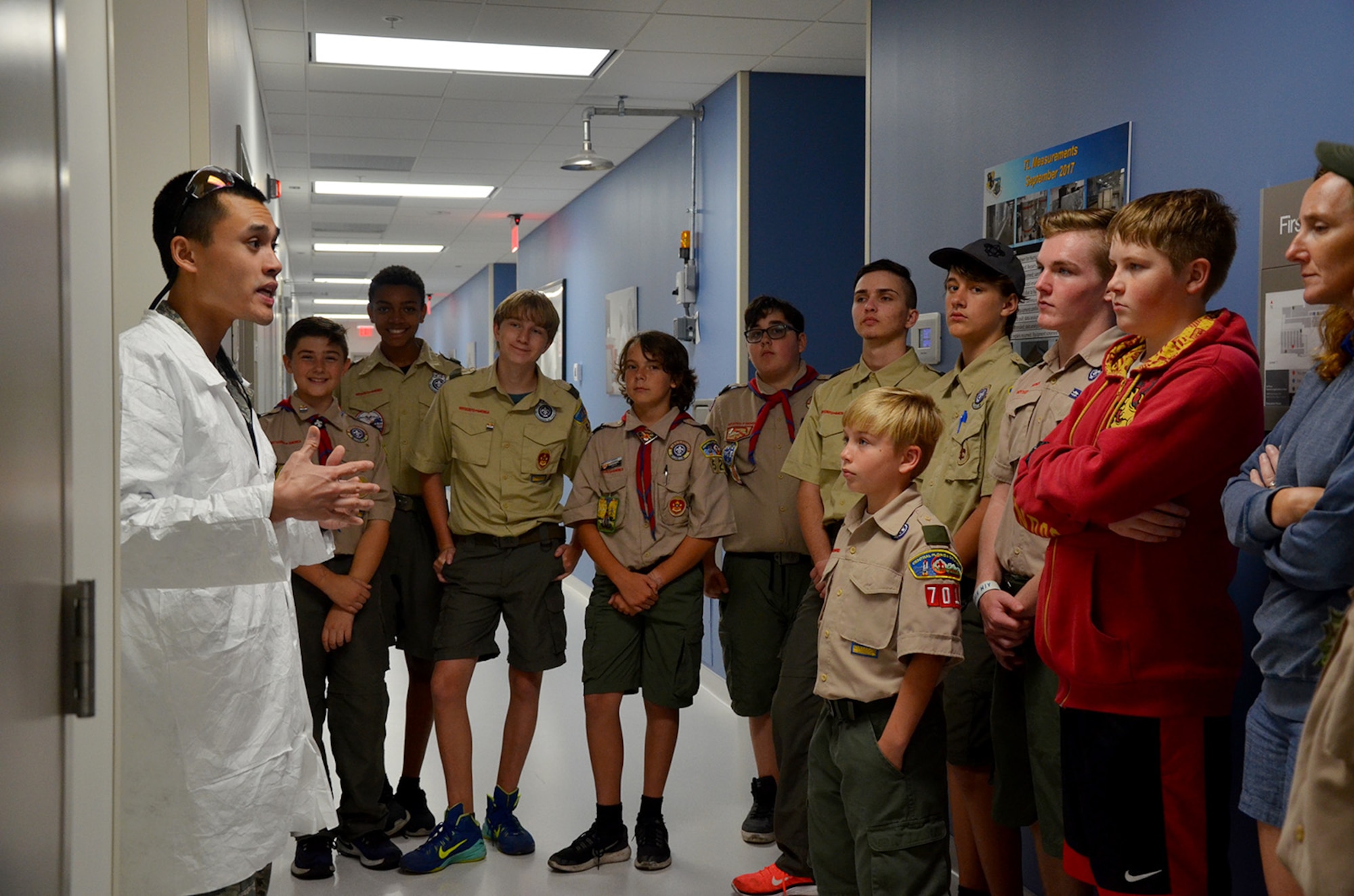 Capt. Sky Thai (left), a physicist at the Air Force Technical Applications Center, Patrick AFB, Fla., briefs a group of Boy Scouts about his job at the center’s Ciambrone Radiochemistry Lab March 31, 2018.  Thai spearheaded the effort to help 98 scouts from across Central Florida earn their Nuclear Science Merit Badge.  (U.S. Air Force photo by Susan A. Romano)
